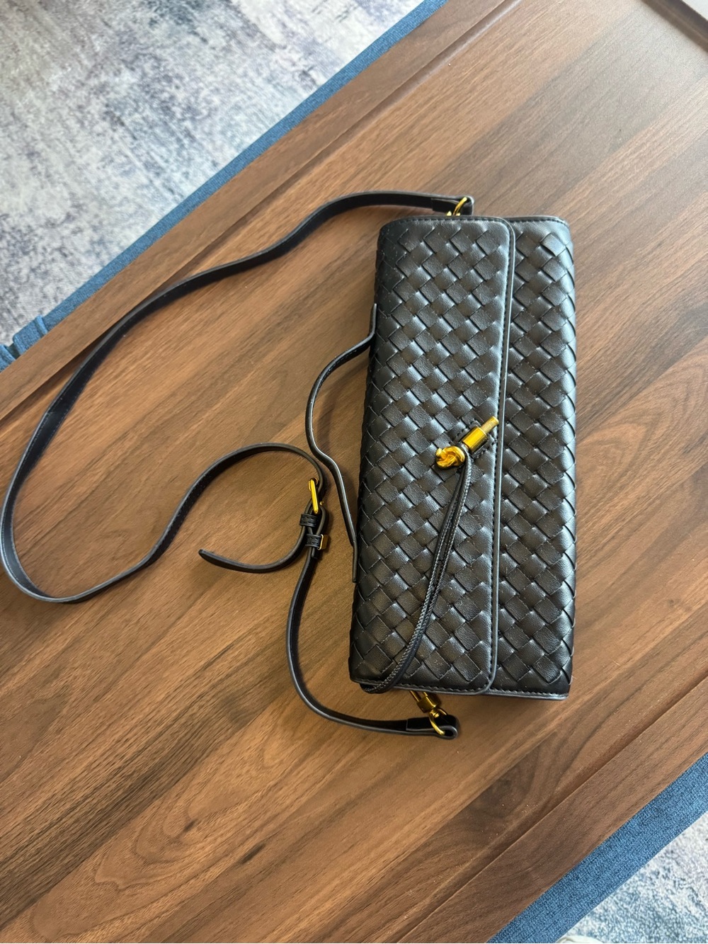 Woven Black Crossbody Bag with Gold Accents